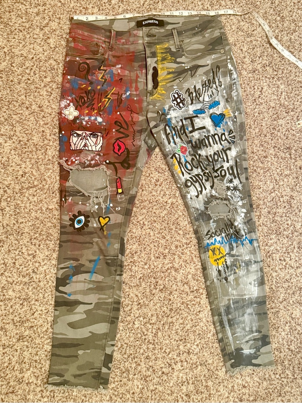 Express Repurposed Camo Jeans with Multicolor Graffiti Accents